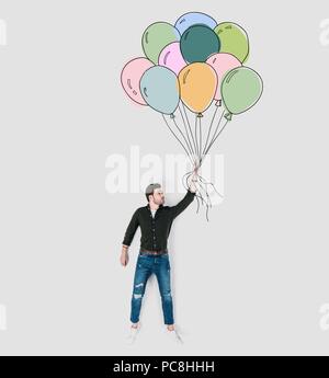 creative hand drawn collage with man holding colorful balloons Stock Photo