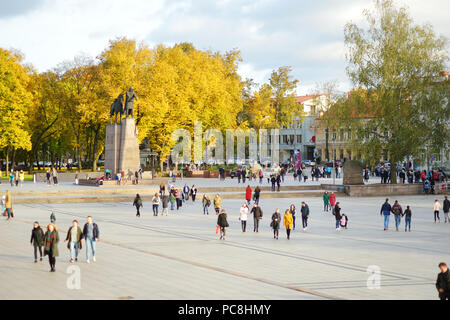 VILNIUS, LITHUANIA - OCTOBER 12, 2017: Lots of people walking down the streets of Vilnius Old Town. Beautiful sunny autumn day in the capital of Lithu Stock Photo