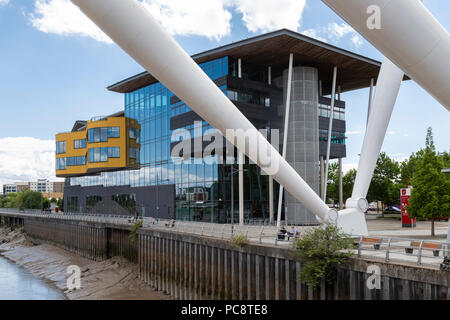 The University of South Wales (USW) and Coleg Gwent, near the supports for the footbridge over the River Usk Stock Photo