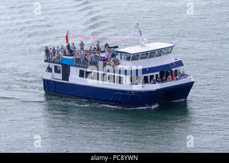 Many passengers on the Ali Cat motor catamaran passenger ferry of Cowes Isle of Wight, owned by David MacBrayne Ltd and operated by Argyll Ferries Stock Photo