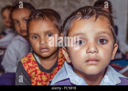 Portrait of Indian rural pre school girls in classroom at village school. Stock Photo