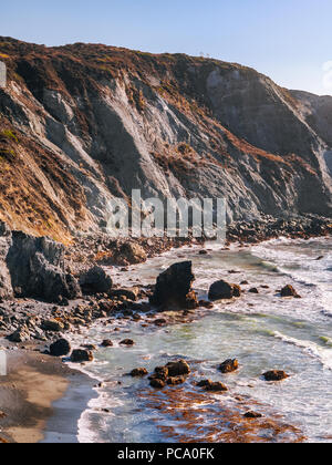 Crashing waves at sunset along Pacific Ocean, Monterey, Peninsula, CA ...