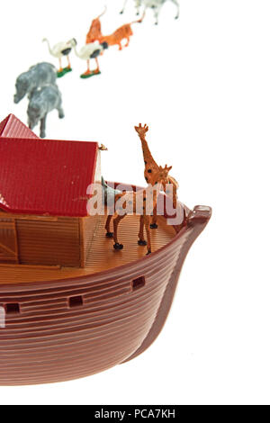 Animals waiting to board the ark - 1960's Noah's Ark play set photographed on a white background. Stock Photo