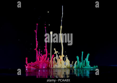 abstract color splash isolated on black background Stock Photo