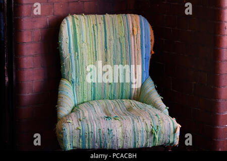 Old Chair In A Moody Lit Room Stock Photo