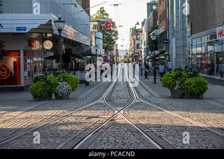 Tram tracks on Drottningatan in the city centre of Norrkoping, Sweden. Norrkoping is a historic industrial town. Stock Photo