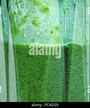 Green smoothie. Smoothie in blender closeup.  Stock Photo