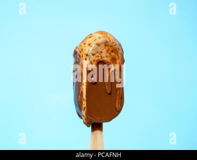 melting melted chocolate ice cream in summer hot weather Stock Photo