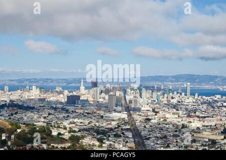 Beautiful aerial view from the San Francisco Twin Peaks overlooking the city's scenic skyline with numerous buildings and landmarks in the background Stock Photo
