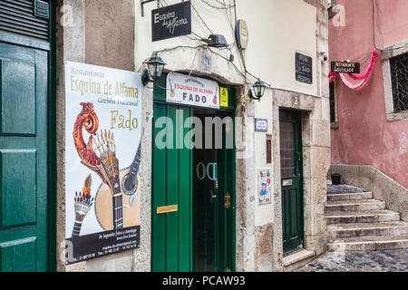 27 February 2018: Lisbon, Portugal - Restaurant advertising Fado, the traditional Portuguese musical genre, in the Alfama District. Stock Photo
