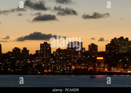 Mumbai Skyline showing Walkeshwar after sunset from Marine Drive, Mumbai, India. Stock Photo