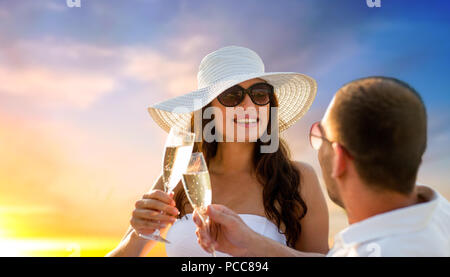 smiling couple drinking champagne on picnic Stock Photo