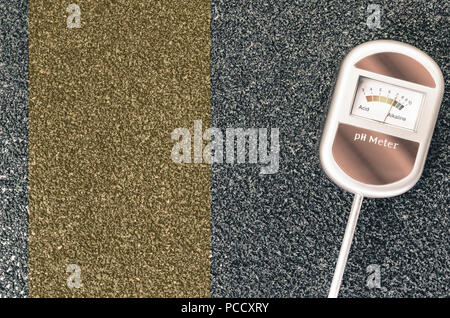 analog soil ph test tool on a dark gray surface - gardening concept Stock Photo