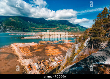 Elevated view of lumber yard in How Sound near Fury Creek near Squamish, British Columbia, Canada, North America Stock Photo