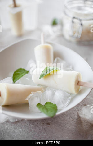 Popsicles made from pineapple and coconut Stock Photo