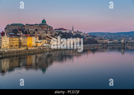 View of Budapest Castle reflecting in the Danube River during early morning, UNESCO World Heritage Site, Budapest, Hungary, Europe Stock Photo