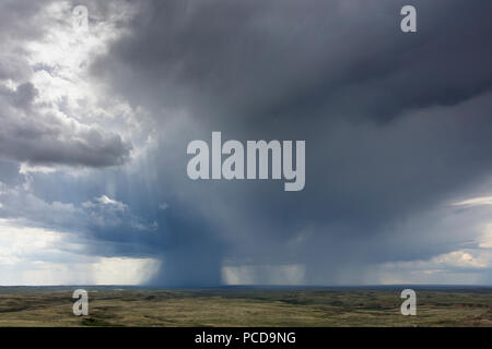 Dark storm clouds of over Grasslands National Park, Saskatchewan, Canada. Stock Photo