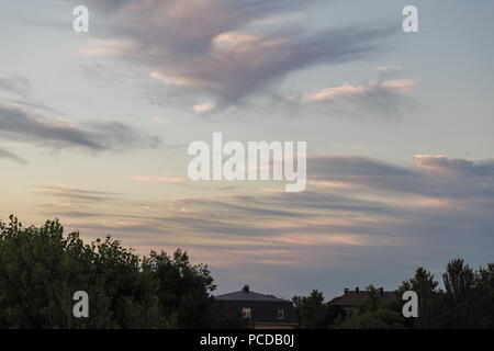 Colorful dramatic twilight sky in evening with cloud at sunset over Lake in Udonthani Thailand .Nice Clear Nature Blue Sky with sun background Stock Photo