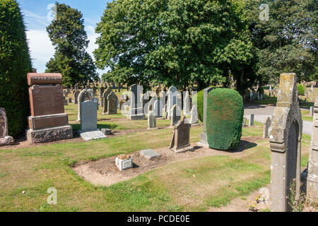 Graves in the cemetery at Kirriemuir in Scotland. A place to go an remember loved ones. Stock Photo