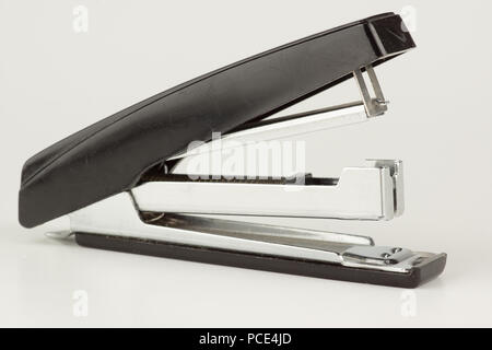 new stapler for stapling papers on a table Stock Photo