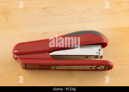 new stapler for stapling papers on a table Stock Photo