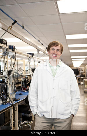 A portrait of a caucasian male technician in a technical research and development site. Stock Photo