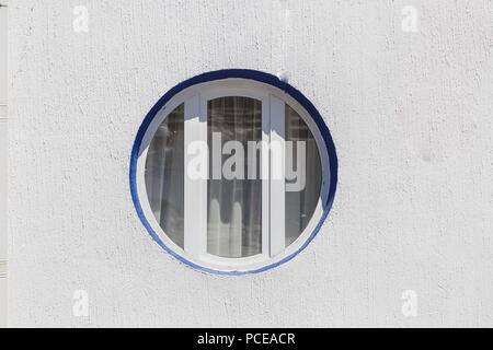 Round and vintage shape of glass window on a brick wall building digital composite with moon. Moon Globe shape courtesy of NASA. Stock Photo
