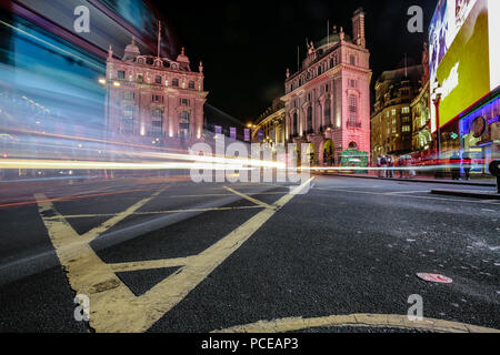 light trails in a long exposure shot in the city centre Stock Photo