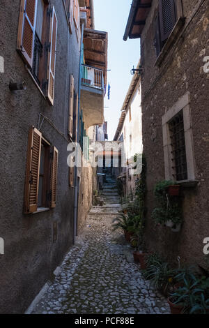 Wood open windows on a medieval town alley. Stock Photo