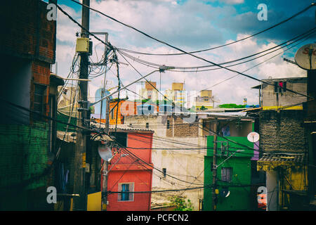 Colourful worn houses of a favela in Brazil. Stock Photo