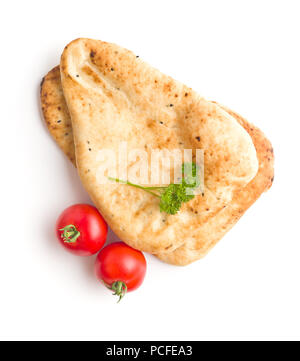 Indian naan bread and tomatoes isolated on white background. Stock Photo