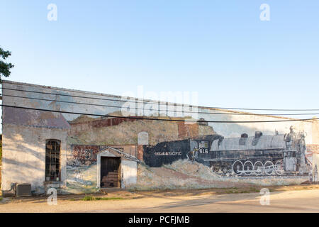 Ghost sign of train in Baird Texas Stock Photo