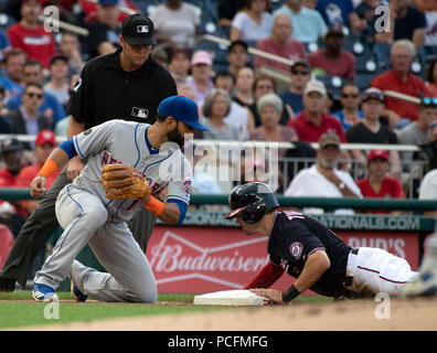 Washington, United States Of America. 31st July, 2018. Washington Nationals shortstop Trea Turner (7) steals third base in the first inning against the New York Mets at Nationals Park in Washington, DC on Tuesday, July 31, 2018. New York Mets right fielder Jose Bautista (11) is late with the tag. Credit: Ron Sachs/CNP (RESTRICTION: NO New York or New Jersey Newspapers or newspapers within a 75 mile radius of New York City) | usage worldwide Credit: dpa/Alamy Live News Stock Photo