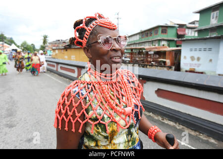 Port of Spain, Trinidad, Tobago. 1st Aug 2018. People wear traditional African attire and colorful accessories with elaborate headwear or hairstyles during the annual Emancipation Day observance procession from Independence Square to the Lidj Yasu Omowale Emancipation Village in the Queens' Park Savannah on August 1, 2018 in Port of Spain, Trinidad. (Photo by Sean Drakes/Alamy Live News) Stock Photo