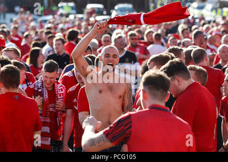 Aberdeen fans drink at the cricket ground next to the stadium before the UEFA Europa League Second Qualifying Round second leg match between Burnley and Aberdeen at Turf Moor on August 2nd 2018 in Burnley, England. (Photo by Daniel Chesterton/phcimages.com) Stock Photo