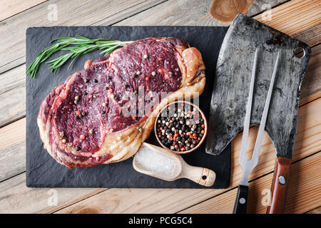 Marbling ribeye steak on wooden board Stock Photo