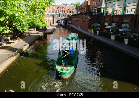 Canal barge going through Birmingham at Brindley Place, Birmingham, West Midlands, England Stock Photo