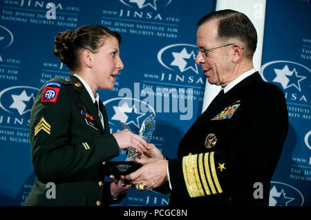 Chairman of the Joint Chiefs Navy Adm. Mike Mullen presents U.S. Army Sgt. Monica L. Brown with the 2008 Jewish Institute for National Security Affairs Grateful Nation Award during a ceremony in Crystal City, Va., Dec. 8, 2008. The award is presented to six individuals that have distinguished themselves through superior conduct in the war on terror. ( Stock Photo