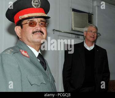 – KABUL – Afghan Brig. Gen. Khudadad Agah, left, commander Training Centers, and U.S. Senator Roger F. Wicker, await the start of a briefing at the Central Training Facility (CTC), Kabul, on January 9, 2010. Sen. Wicker was joined by Sens. Mitch McConnell, Lisa Murkowski, and Mike Crapo and Rep. Michael Castle for a visit to CTC and other facilities in the area. The Congressional delegation received briefings from CTC, NATO Training Mission-Afghanistan (NTM-A), and International Security Assistance Force senior leadership and met with Afghan National Police officers while in the Kabul area. Th Stock Photo