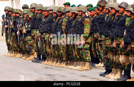 KABUL, Afghanistan – Students of the Quick Reaction Force and Security course participate in a graduation ceremony held at the Afghan National Army Air Corps base in Kabul, Afghanistan on April 8, 2010. The five week long intensive course, which covered topics such as, ground combatives, mounted patrolling, rifle and machine gun training, and others in relation to the security of the Air Corps was the first to have afghans design and conducted with minimal American mentor involvement. (US Navy Stock Photo