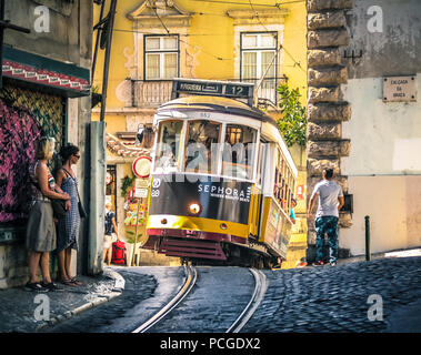Lisbon, Portugal. Tram 12 climbing up to Travessa do Açougue in Graça district. Stock Photo