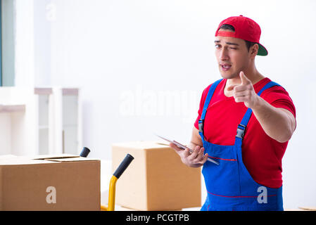 Contractor worker moving boxes during office move Stock Photo