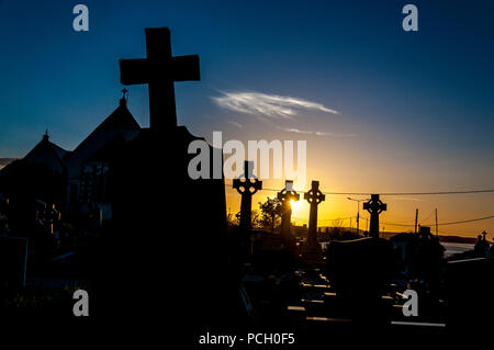 Sunset, cemetery graveyard in Ardara, County Donegal, Ireland.
