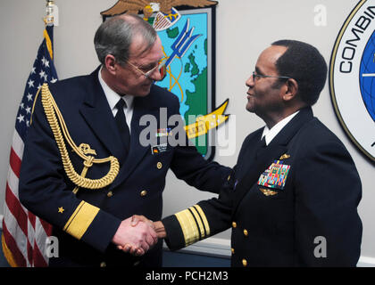 Rear Adm. Karl-Wilhelm Bollow, left, German defense attache, and Vice Adm. Mel Williams Jr., commander of U.S. 2nd Fleet, shake hands after signing a mutual declaration of intent regarding the German navy frigate FGS Hessen. Hessen is preparing to get underway from Wilhelmshaven, Germany, en route to the U.S. to conduct port visits and become a part of the Harry S. Truman Carrier Strike Group. Stock Photo