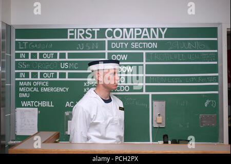 ANNAPOLIS, Md. (June 30, 2016) A plebe at the U.S. Naval Academy (USNA) stands watch for the first time in Bancroft Hall during induction day (I-day) 2016. The new class includes 853 men and 331 women. 28 percent of the incoming class is made up of women, making this the largest number of women to be inducted into the Naval Academy. Stock Photo