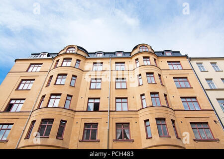 Vasastan typical century old buildings in yellow roughcast in Stockholm, Sweden. Stock Photo