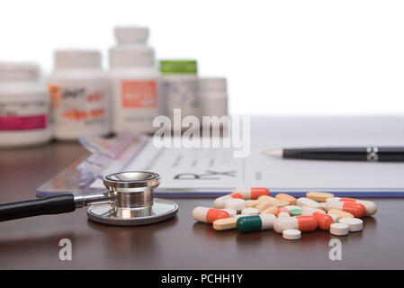 Doctor writing rx prescription. Stock Photo