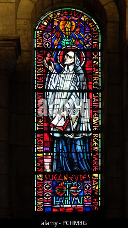 Saint John Eudes, stained glass window in Basilica of the Sacre Coeur, dedicated to the Sacred Heart of Jesus in Paris, France Stock Photo