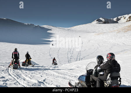 Referees are watching the race on the plateau of Lago-Naki in Adygea, Russia February 2, 2012. Stock Photo