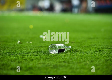 Plastic trash can on the turf on a soccer field Stock Photo